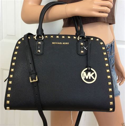 does michael kors use real leather - are Michael Kors purses leather.